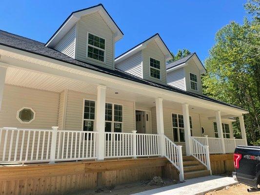 Beautiful new home in Fenton Michigan.
Linen siding with white soffit and fascia. 
Azek post wraps.