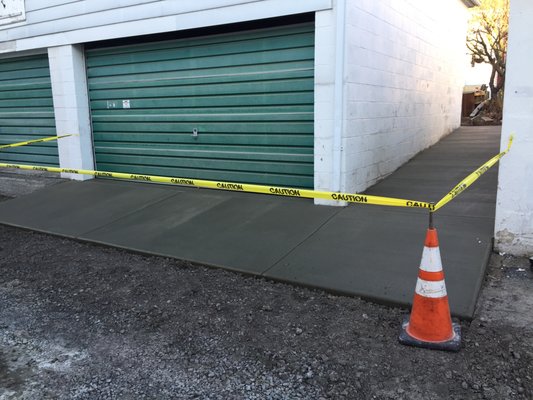 Walkway and garage apron.