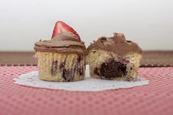 Brahmsberry: Strawberry cupcake with chocolate chocolate chip cookie inside topped with chocolate buttercream