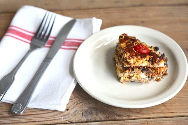 Cheese enchiladas with black beans and brown rice