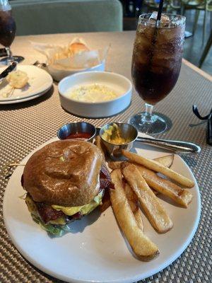 Cheeseburger, fries, table bread & butter