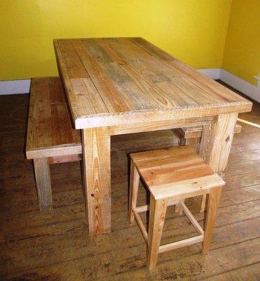 Farm style table with benches made from reclaimed wood