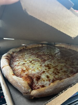 Large cheese pizza with extra cheese. So delicious!!