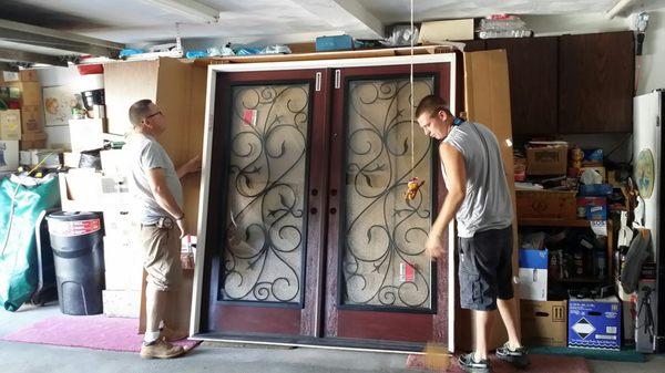 Roy & Chris inspecting the doors before install