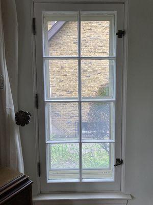 Casement window with storm installed (inside house view)