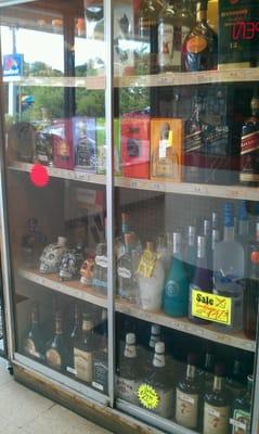 High priced liquor case in front