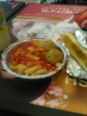 Ziti with meatballs, and a breadstick.