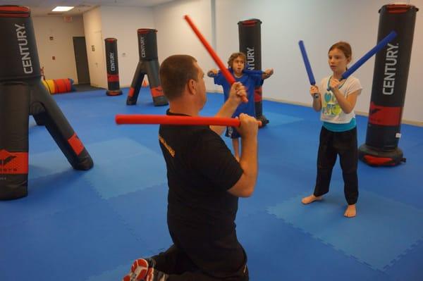 Great coordination drills in our kids karate classes in Jupiter + Palm Beach Gardens!