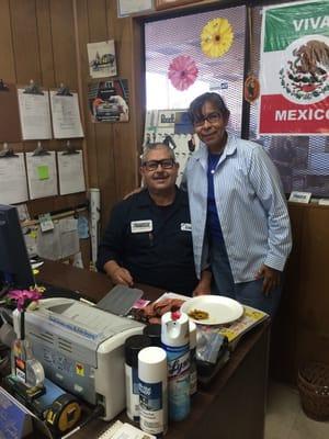 Owner/mechanic Luis Rodriguez and wife Lola.