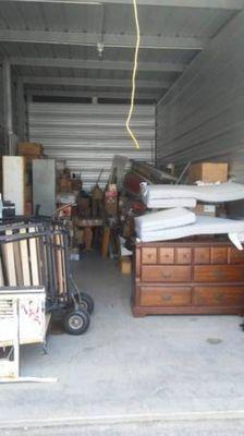 Neatly packed storage unit for older couple.