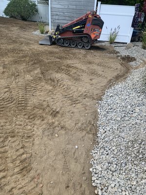 Here's a decent landscaping job we did in Holden brought in 60 yards of topsoil as well as 72 ton of 3/8 inch stone to border the perimeter.