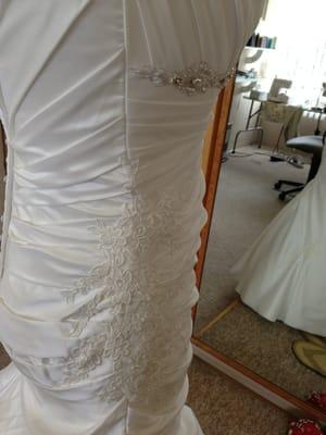 Side view of my dress, lace appliqué and rouching.