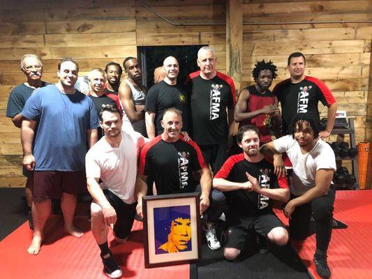 The adult class presenting a gift to our main Sifu. Ages range from 23-71