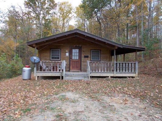 Cabin E is a one-room cabin that is very secluded with satellite TV, hot tub and gas grill.