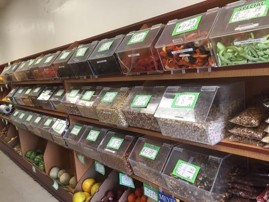 Rows of nuts and dried fruit.