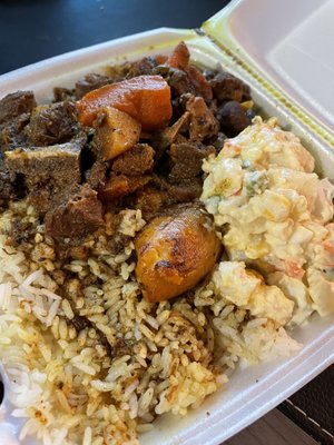 Curry Goat Dinner 8/10 I really liked the curry & plantains! I wasn't a fan of the potato salad & the White Rice had a few hard pieces