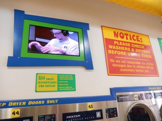 TV's and signage above dryers