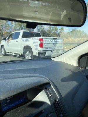 Picture of the company truck right before they stopped traffic at a green light.