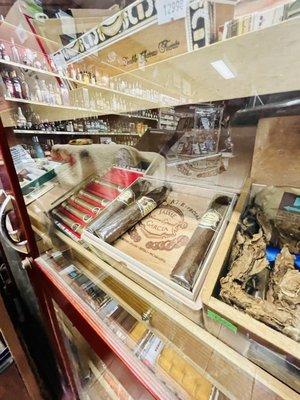 Cigars in a nice humidor. Makes the perfect gift in a quick fix! Lots of selections.