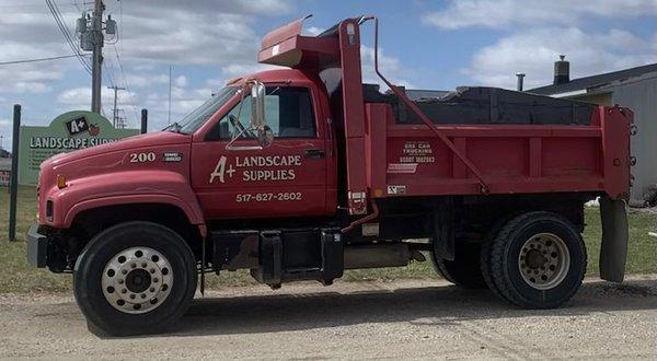 Hauls 7 yards of Mulch
 5 yards of Stone & dirt