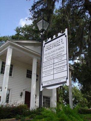 Lamp Post Building is a turn-of-the-century plantation home.