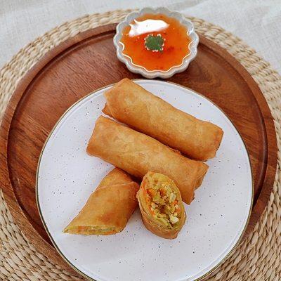 Vegan Spring Roll with sweet chili sauce.