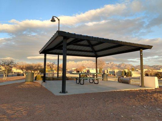 Covered picnic table with a gorgeous view of the Organ Mountains.