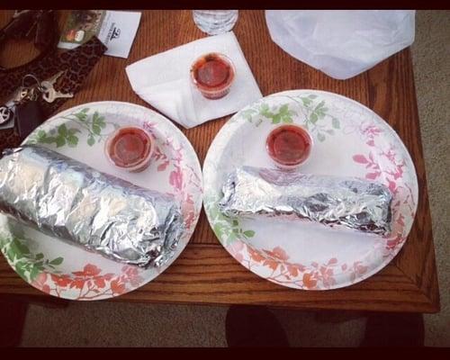 Super burrito on the left, my regular on the right, salsa too!