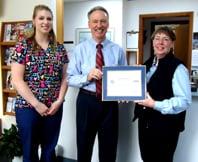 Receiving the Patriotic Employer Award from the U.S. Department of Defense.