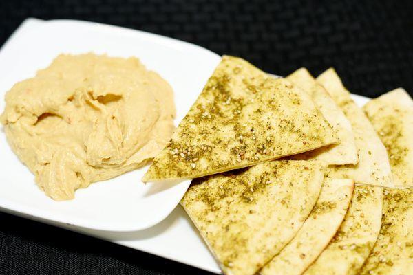 Fresh-baked Arabic Bread served with hummus.