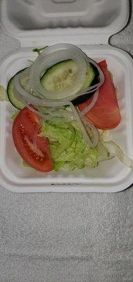 The salad included with the frozen entree.   Iceburg lettuce, rock hard tomato wedges and unshaved huge cuccumber. Shoved into a box.