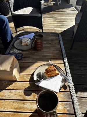 Cinnamon roll, hot chocolate, cheddar biscuit, and drip coffee.