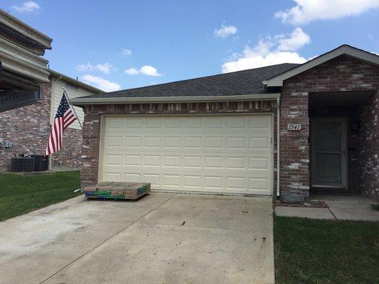 Raised panel garage door-Almond