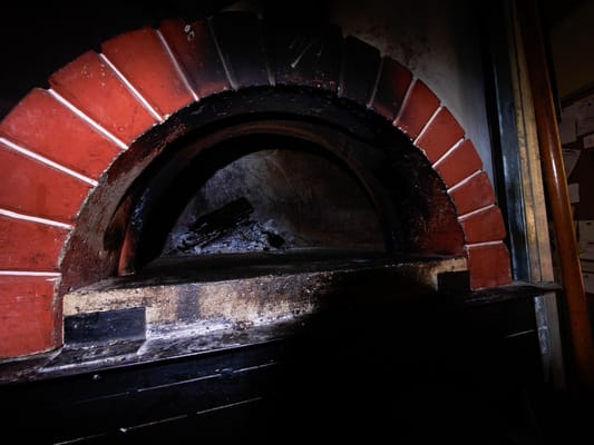 Wood fire grill inside their truck...Awesome!