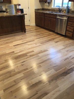 After photo gorgeous natural hickory, no stain needed and water base sealer keeps it natural. Beautiful!