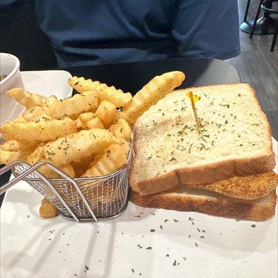 Fish sandwich and seasoned fries