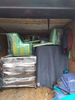 Shrink wrapped furniture during a residential relocation.