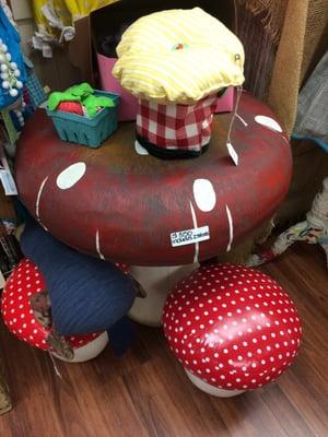 Mushroom table with toadstools was $350 or so I think