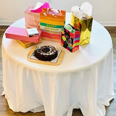 Cake/Gift table and white tablecloth