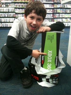 Elijah's savings/ birthday present. Xbox 360 250 gig preowned! Pretty awesome!