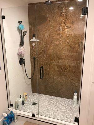 Frameless shower glass installed by Golden Glass