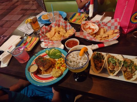 Pork poblano tacos, baked cod, french gold margarita, the floor is guava margarita