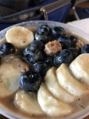 Chai bowl with banana, blueberries and granola on top (it's not liquidy it just melted bc I had to drive home )  SO Good!!!