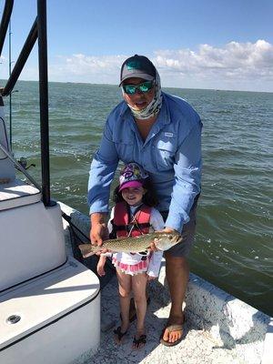 Bella with her first trout