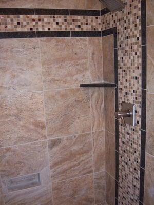 Tile shower w/ glass accents