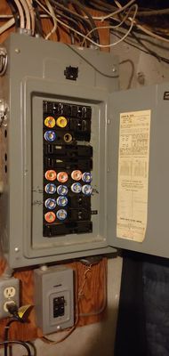 Old. 200 amp fuse box being replaced with new 200 amp panel with circuit breakers