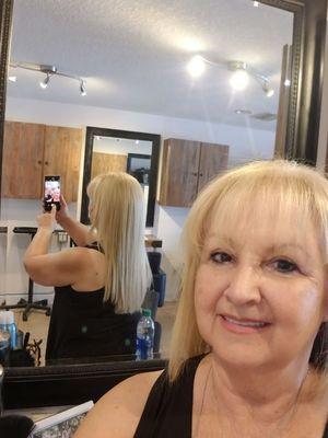 keratin hair straightener  treatment ... keeps frizz out .... Michelle Rasor does amazing job