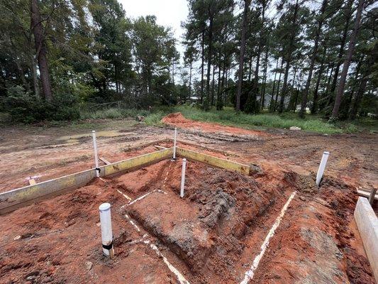 Installing slab plumbing for new house.