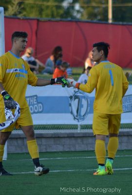 A keeper swap, and a "good luck"/"good job" fist bump sign in/out. The Milwaukee Torrent, Milwaukee's  professional outdoor soccer team.