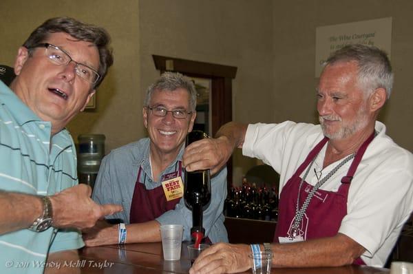 Serving wine at the Courtyard during the OC Fair.